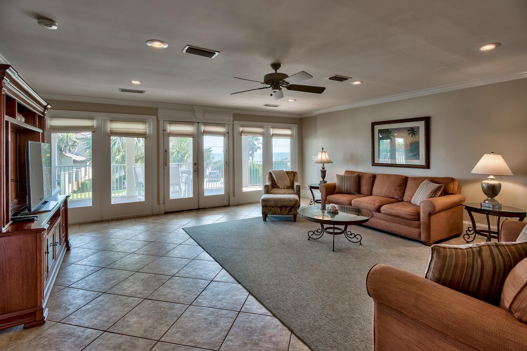 601 Blue Mountain Road Santa Rosa Beach, FL 32459 - Photo 36 of 51 a living room with furniture and a flat screen tv