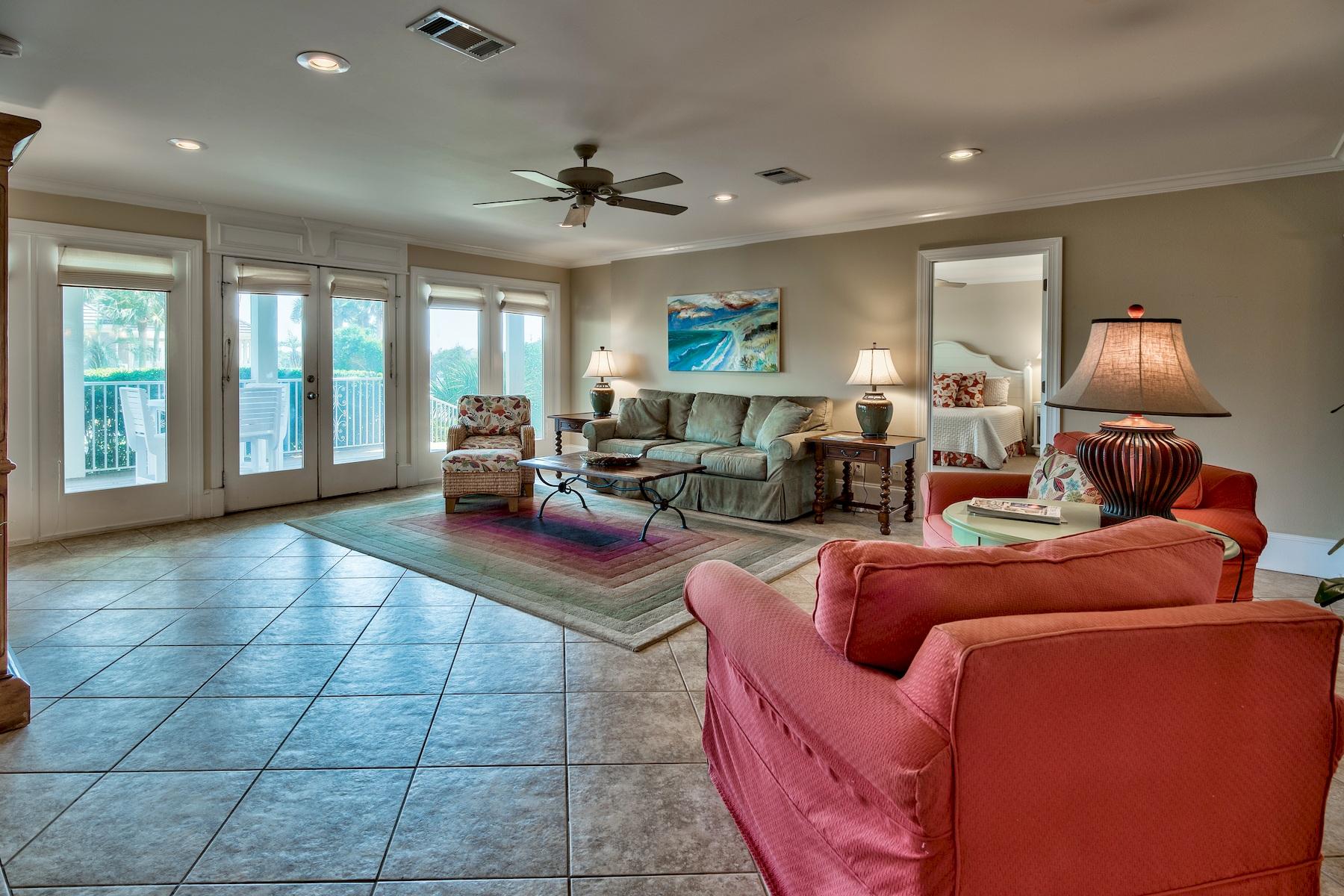 601 Blue Mountain Road Santa Rosa Beach, FL 32459 - Photo 7 of 51 a living room with furniture and a chandelier