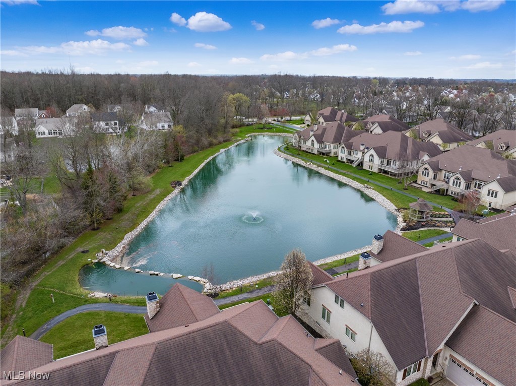 5349 Slater Ridge Westerville, OH 43082 - Photo 49 of 50 Aerial perspective of suburban area with a large body of water and a tree filled landscape
