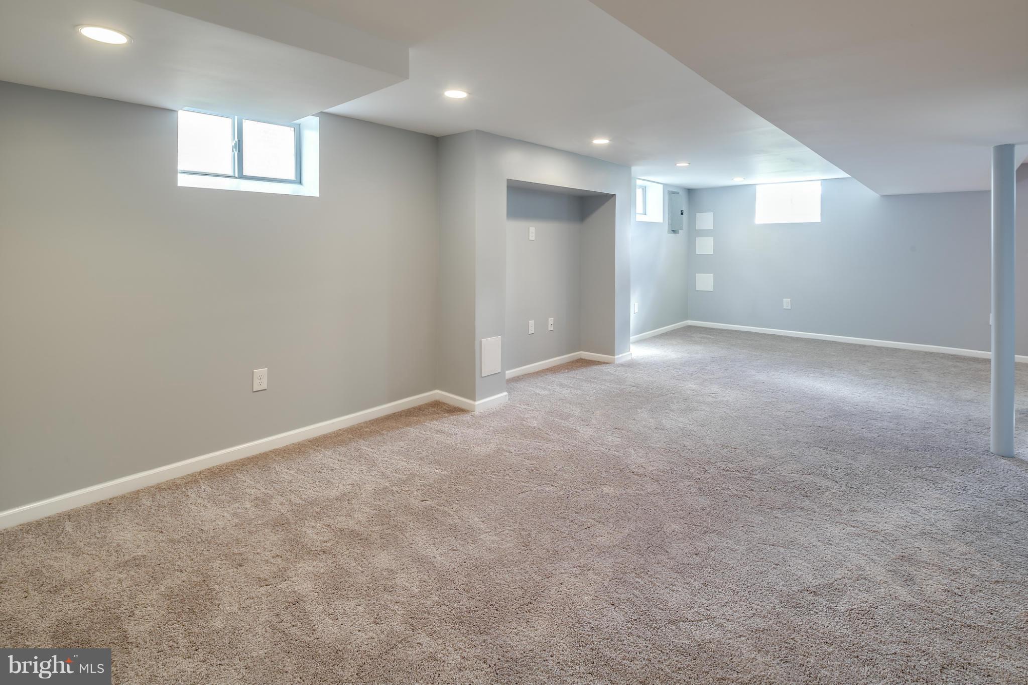 6704 Campfield Road Baltimore, MD 21207 - Photo 24 of 30 a view of an empty room with a window