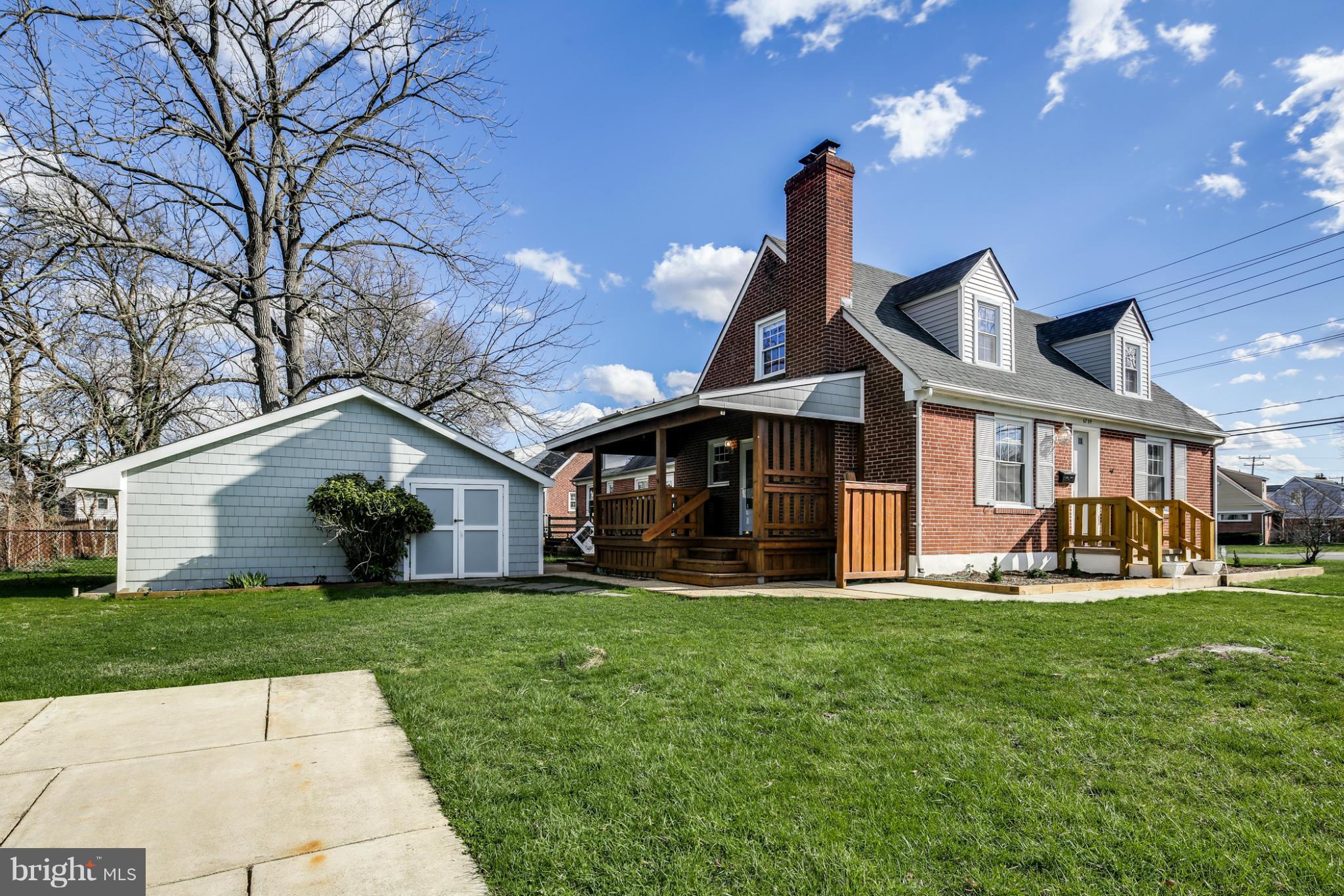 6704 Campfield Road Baltimore, MD 21207 - Photo 30 of 30 a front view of a house with a yard