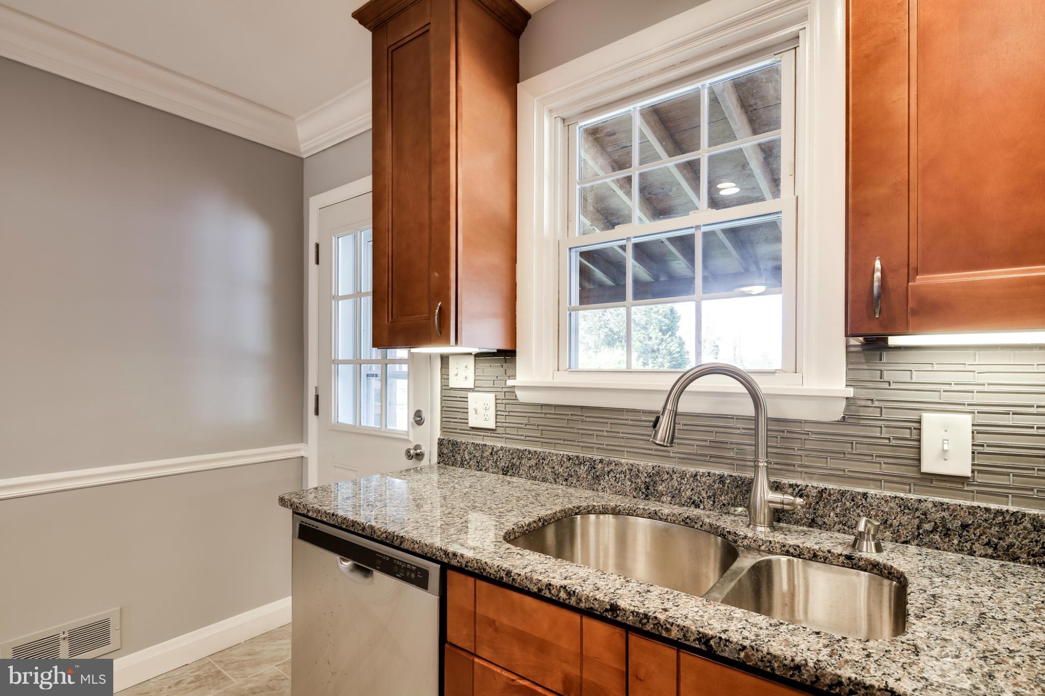 6704 Campfield Road Baltimore, MD 21207 - Photo 9 of 30 a close view of a sink and a window