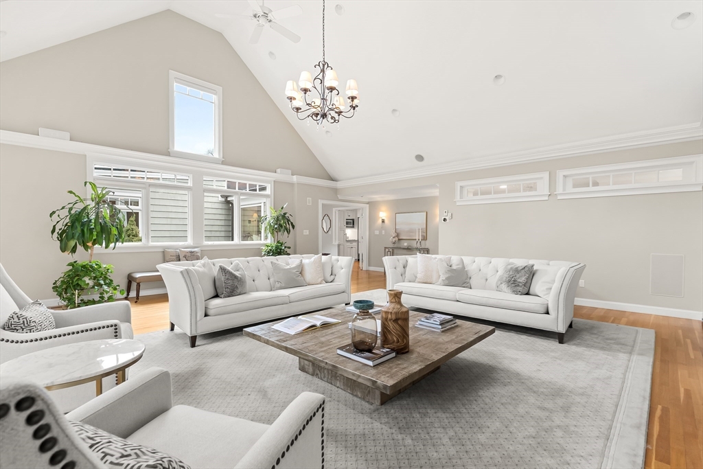 27 Radcliffe Road Wellesley, MA 02482 - Photo 5 of 38 a living room with furniture and a chandelier