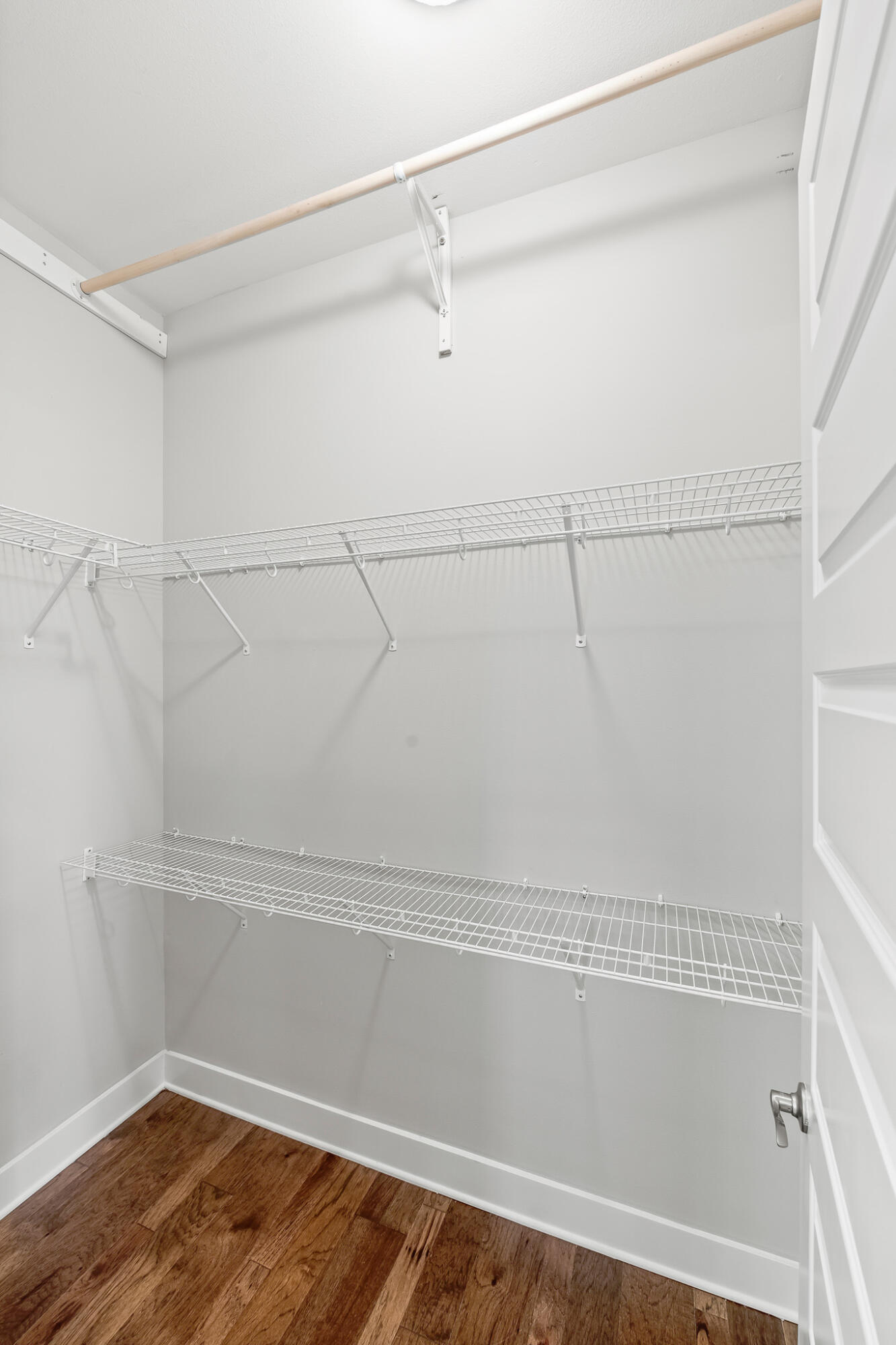 85 York Ln Inlet Beach, Unit A Inlet Beach, FL 32461 - Photo 35 of 40 a view of a room with racks on the wall