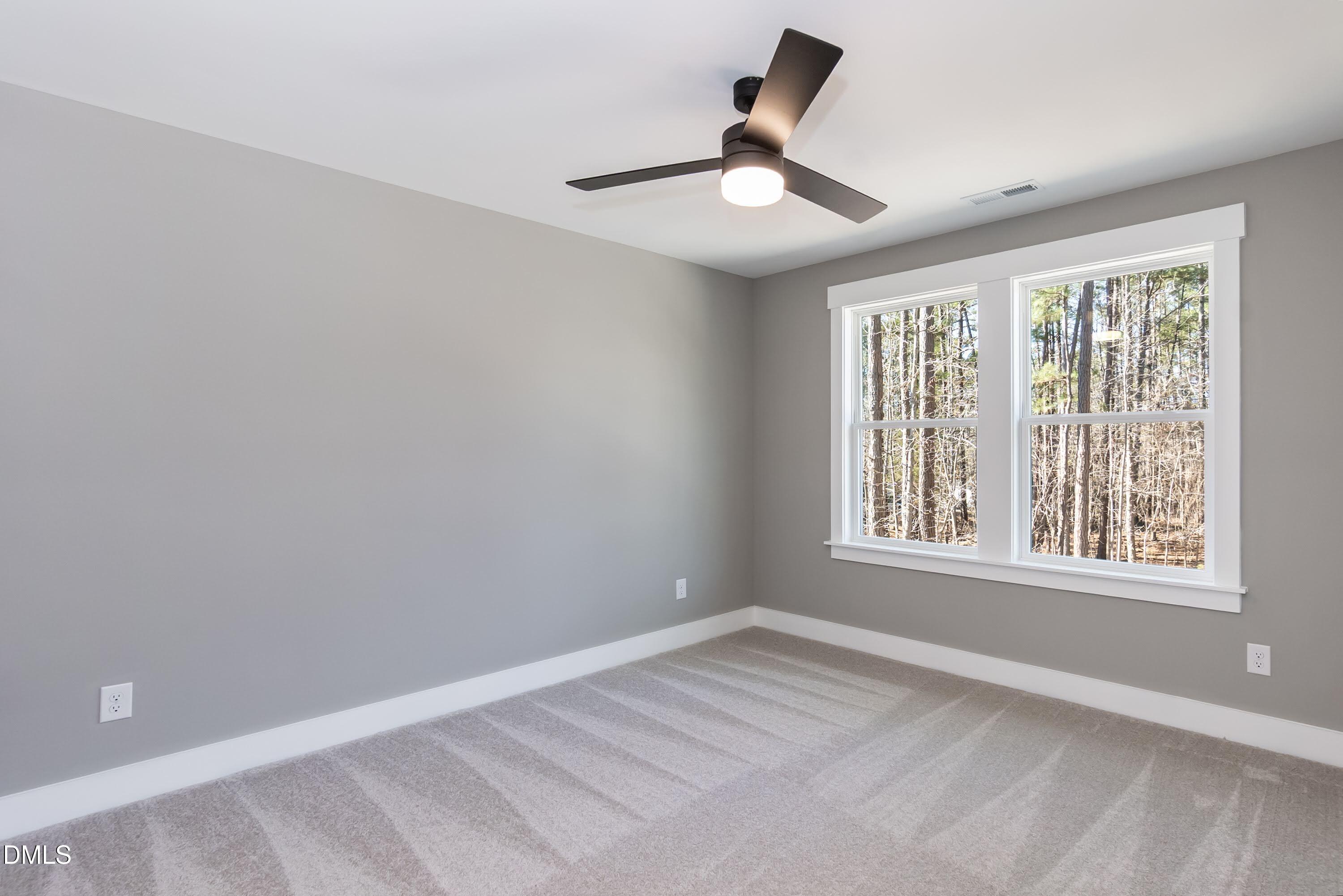104 Buffalo Drive Spring Hope, NC 27882 - Photo 30 of 48 a view of an empty room with a window