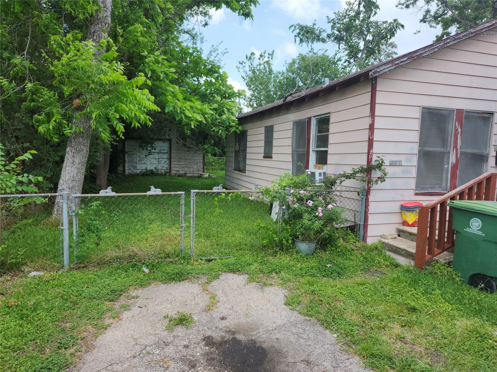 4215 Edison Street Houston, TX 77009 - Photo 3 of 13 a front view of a house with garden