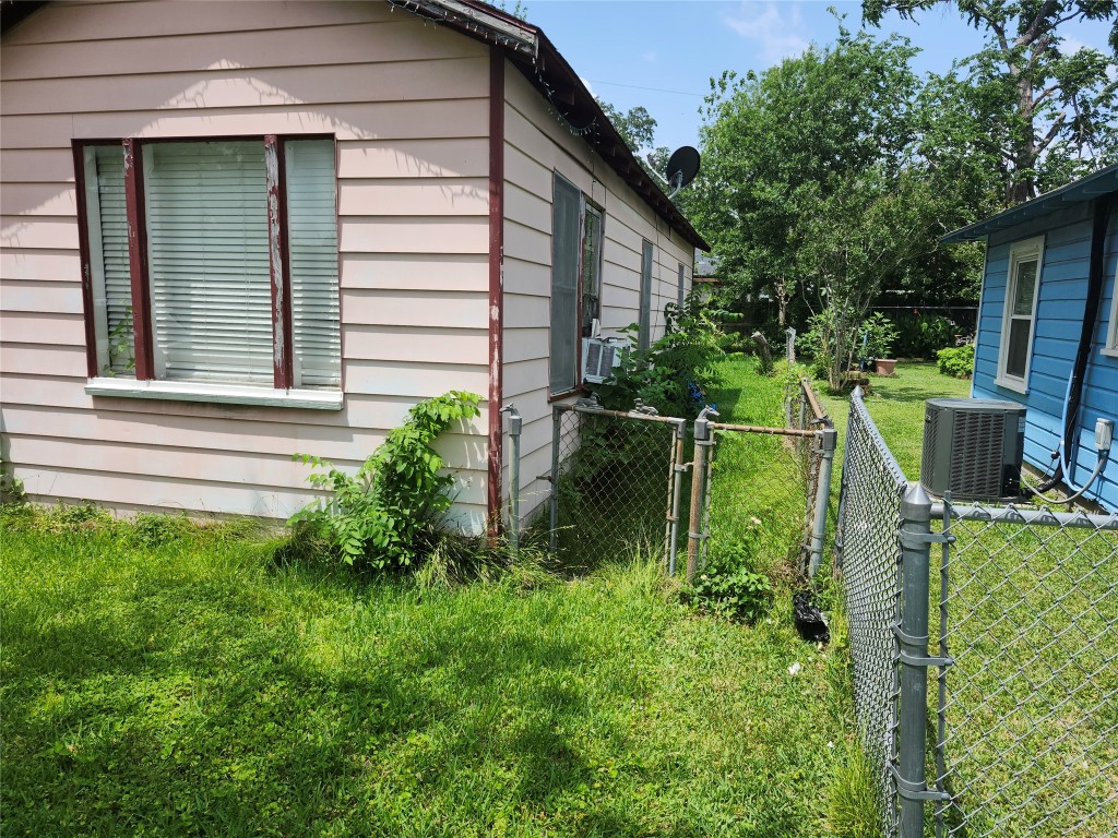4215 Edison Street Houston, TX 77009 - Photo 4 of 13 a backyard of a house with plants and outdoor seating