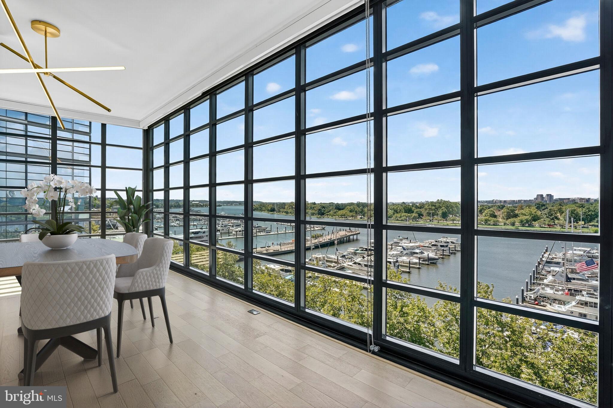 45 Sutton Square Southwest, Unit 509 Washington, DC 20024 - Photo 6 of 26 Expansive dining & living room with terrace