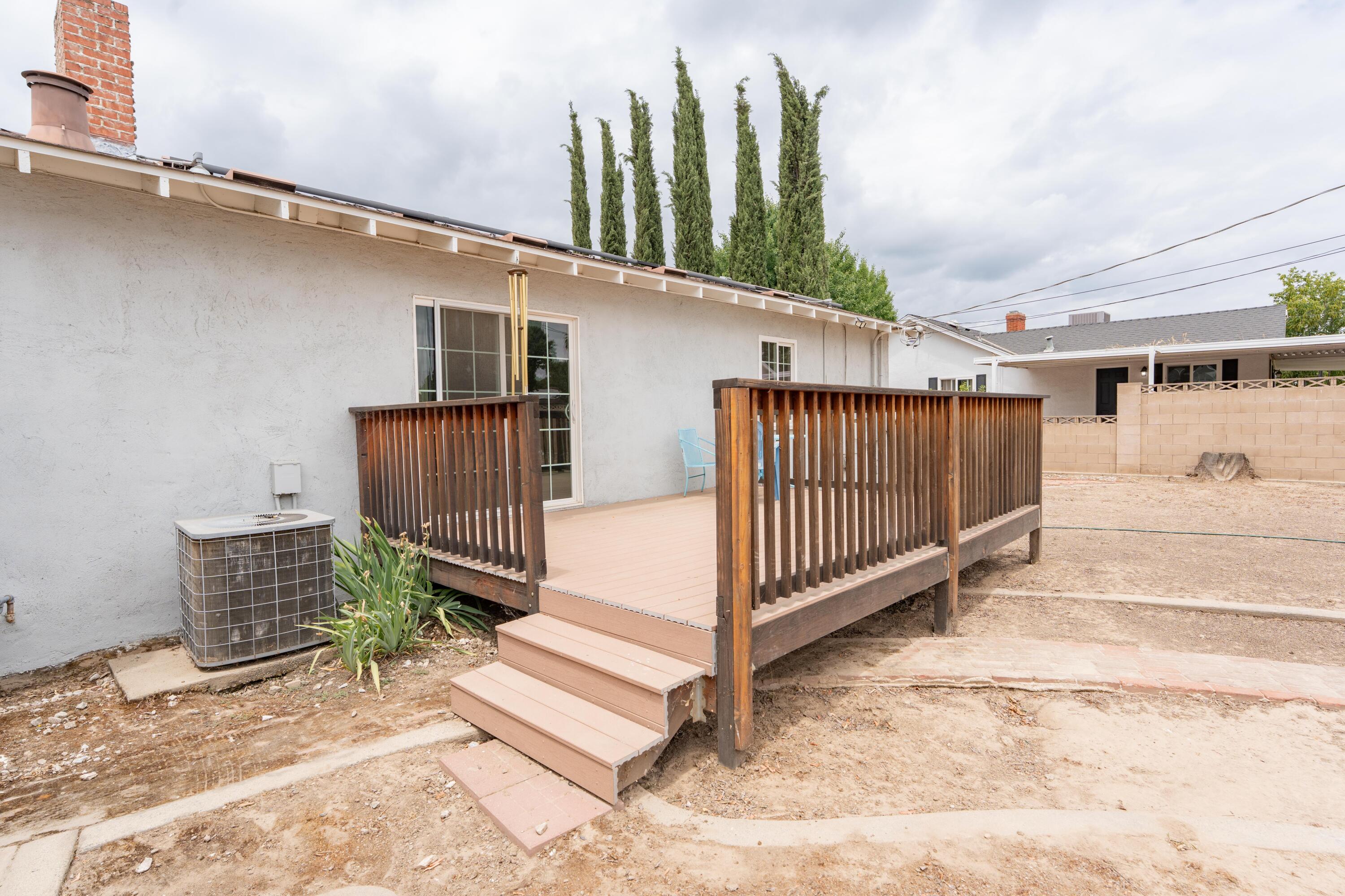 570 North Birch Avenue Reedley, CA 93654 - Photo 42 of 52 a view of a porch with a bench
