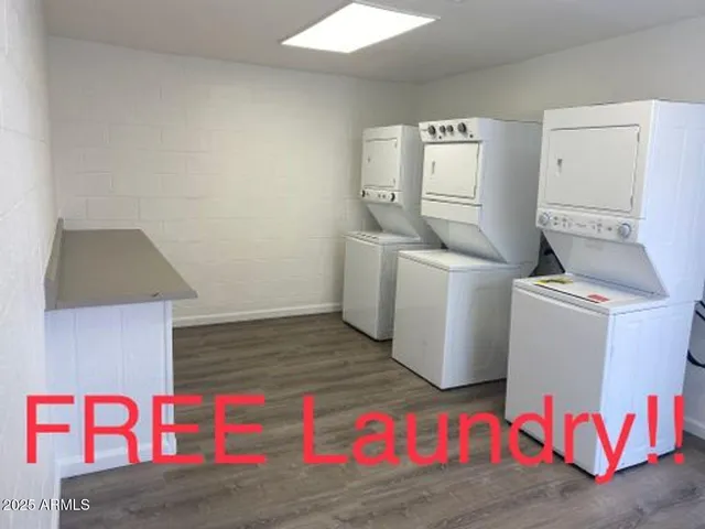 a utility room with dryer and washer