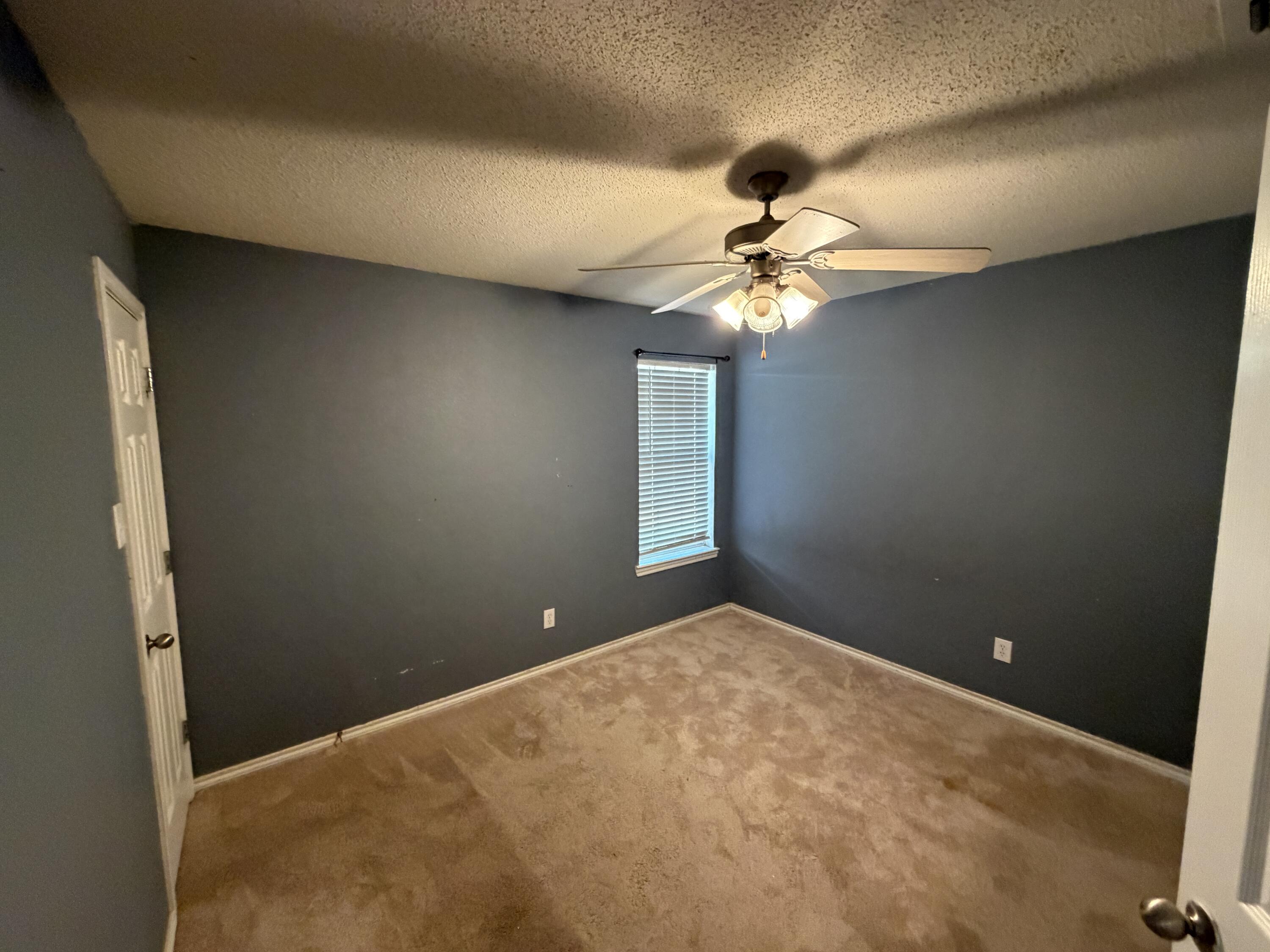 1430 78th Street Lubbock, TX 79423 - Photo 10 of 14 Middle Bedroom