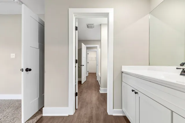 a view of a room with racks on the wall