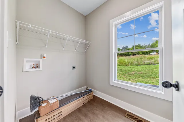 an aerial view of a house with a swimming pool