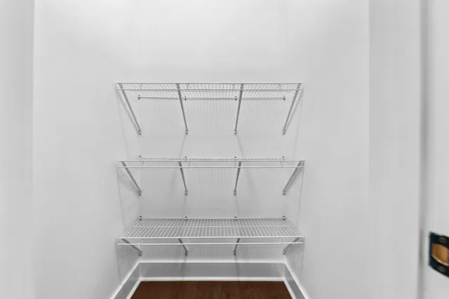 an aerial view of a house with a garden