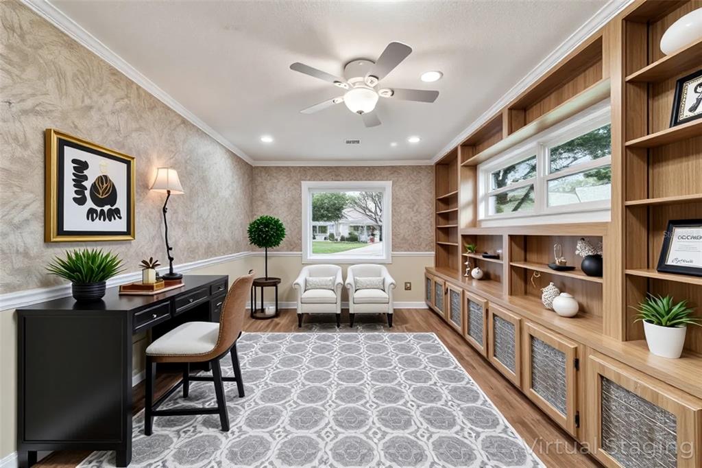 9068 Southwest 82nd Terrace, Unit A Ocala, FL 34481 - Photo 18 of 30 a living room with furniture and a book shelf