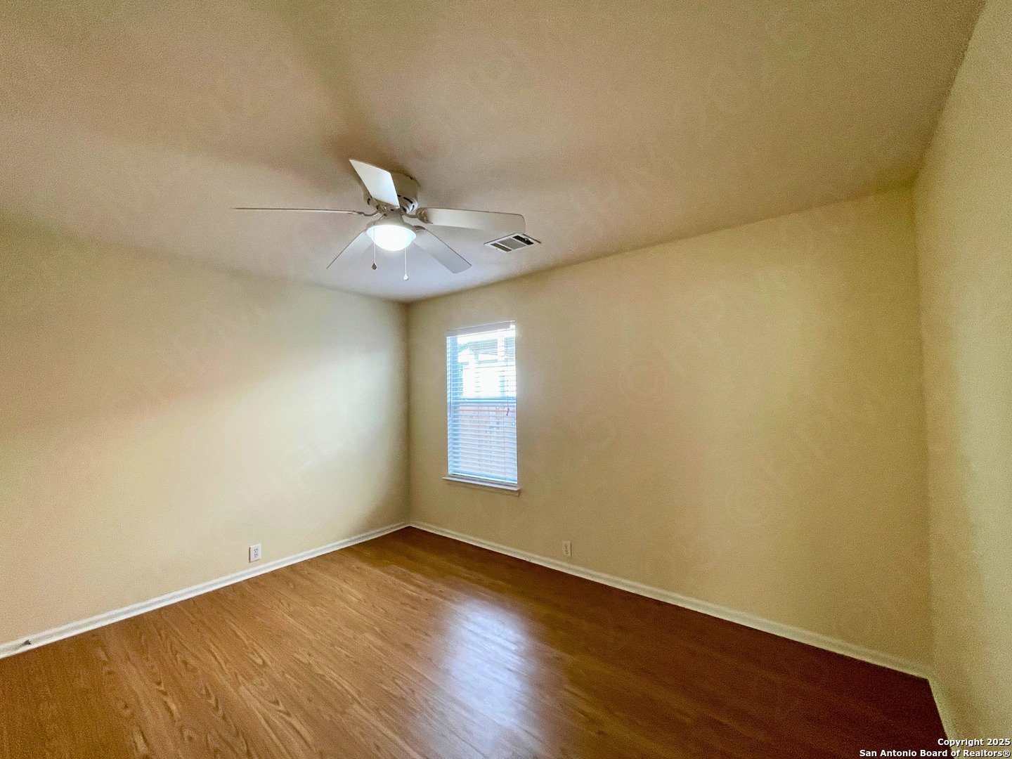 9523 Ascending Port Converse, TX 78109 - Photo 15 of 18 a view of an empty room and window