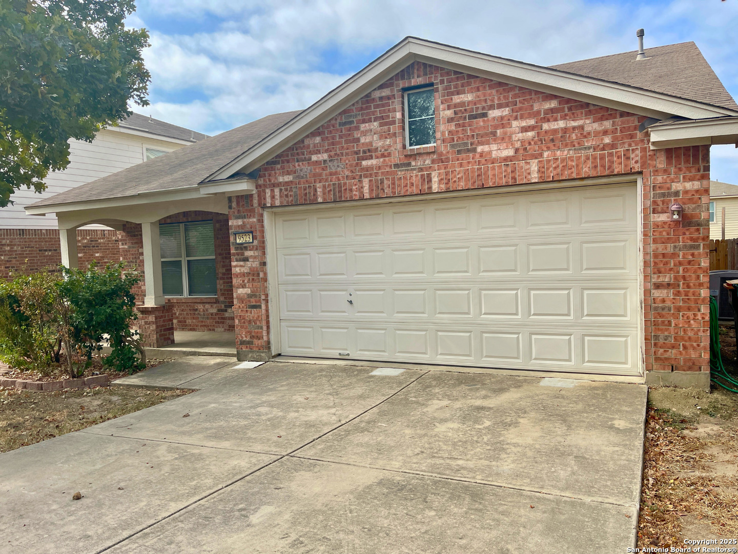 9523 Ascending Port Converse, TX 78109 - Photo 3 of 18 a front view of a house with a garage