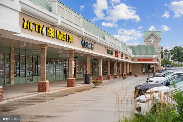 a view of a building with sitting area