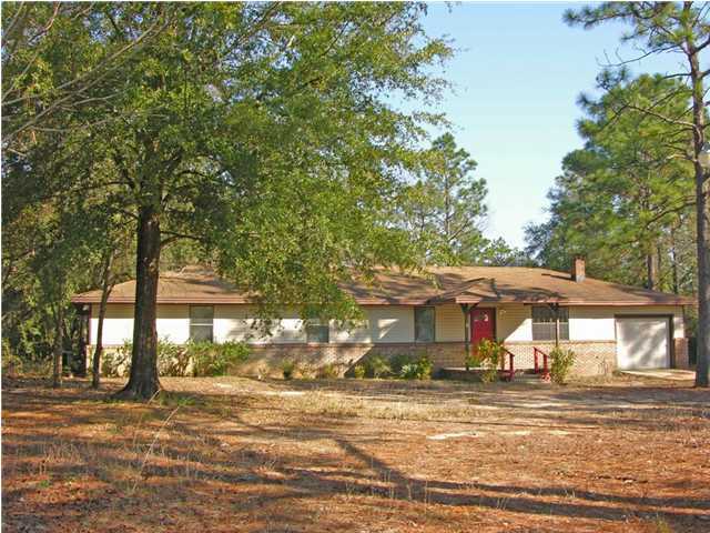 4555 Rainbird Rise Road Crestview, FL 32539 - Photo 1 of 32 a view of a house with a yard
