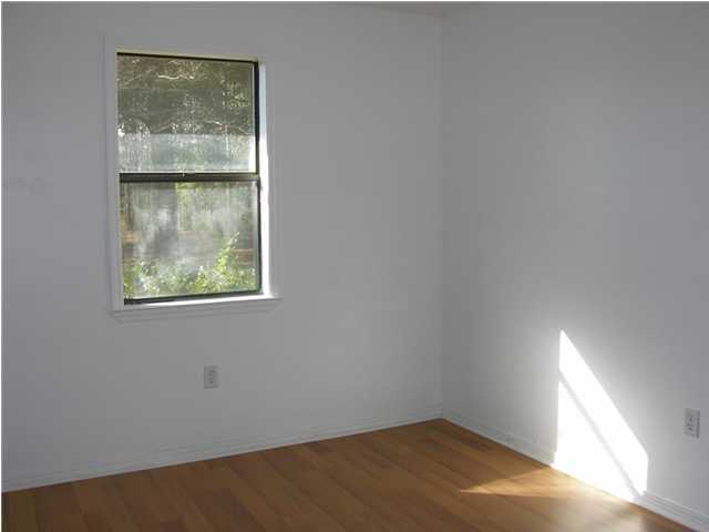 4555 Rainbird Rise Road Crestview, FL 32539 - Photo 11 of 32 an empty room with a window