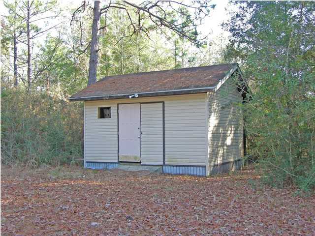 4555 Rainbird Rise Road Crestview, FL 32539 - Photo 29 of 32 a house view with a backyard space