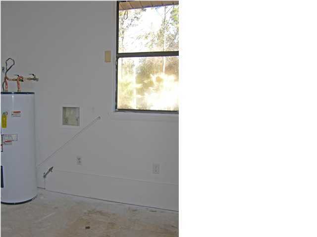 4555 Rainbird Rise Road Crestview, FL 32539 - Photo 30 of 32 a close up of a wall