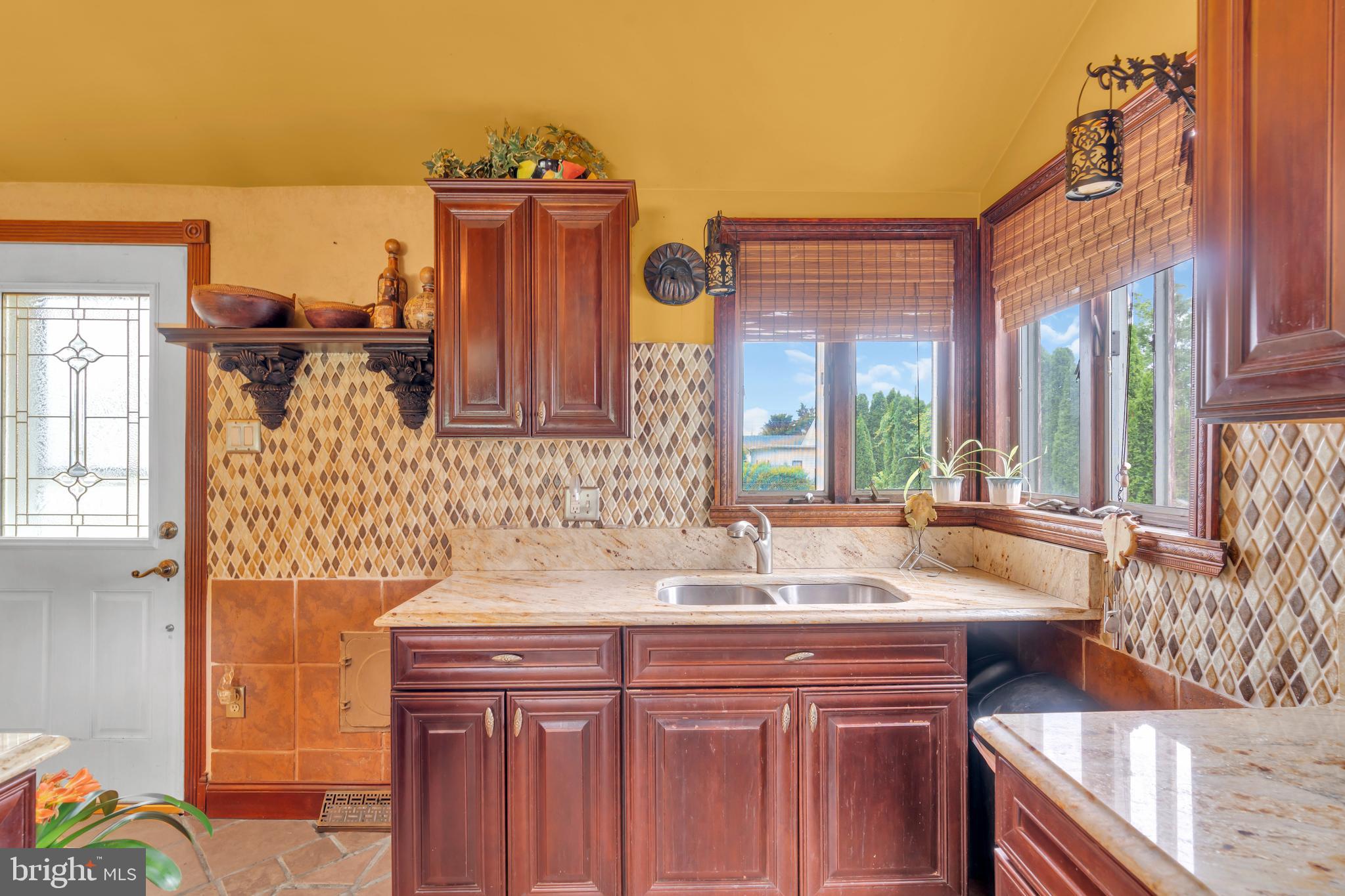516 River Drive Riverside, NJ 08075 - Photo 15 of 82 a bathroom with a granite countertop sink and a large mirror