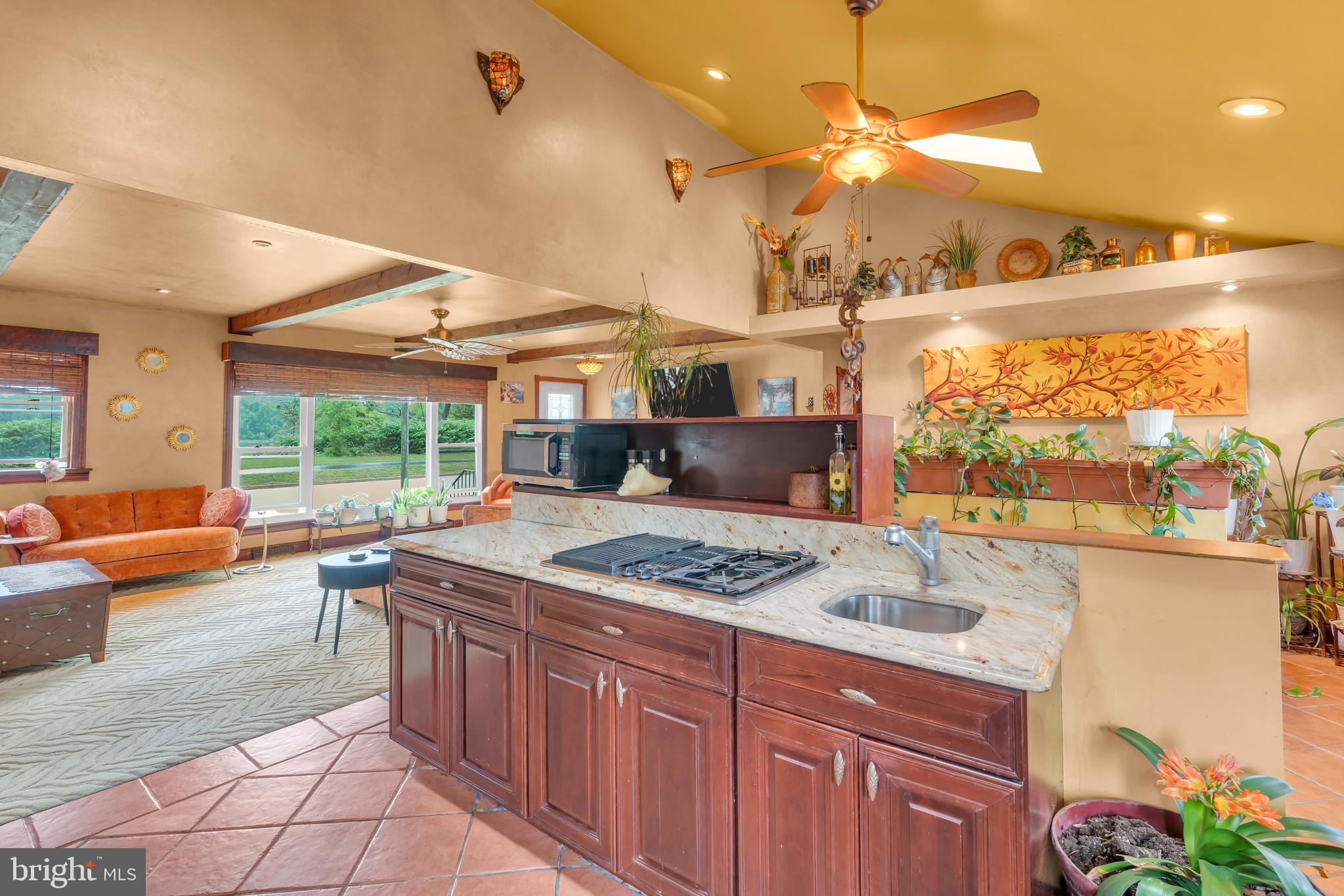 516 River Drive Riverside, NJ 08075 - Photo 16 of 82 a kitchen with a stove a sink and a wooden cabinets