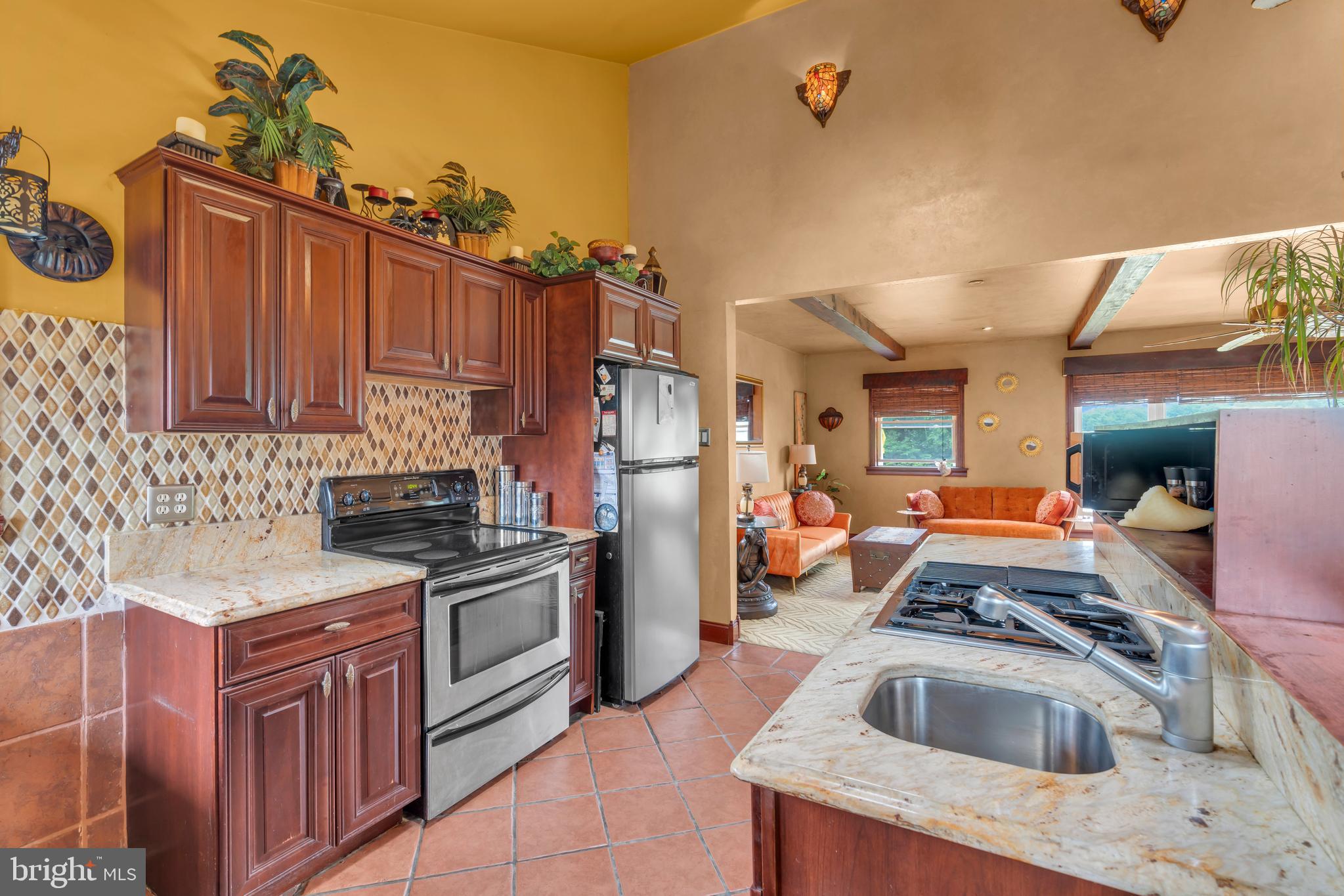 516 River Drive Riverside, NJ 08075 - Photo 17 of 82 a kitchen that has a sink and a stove