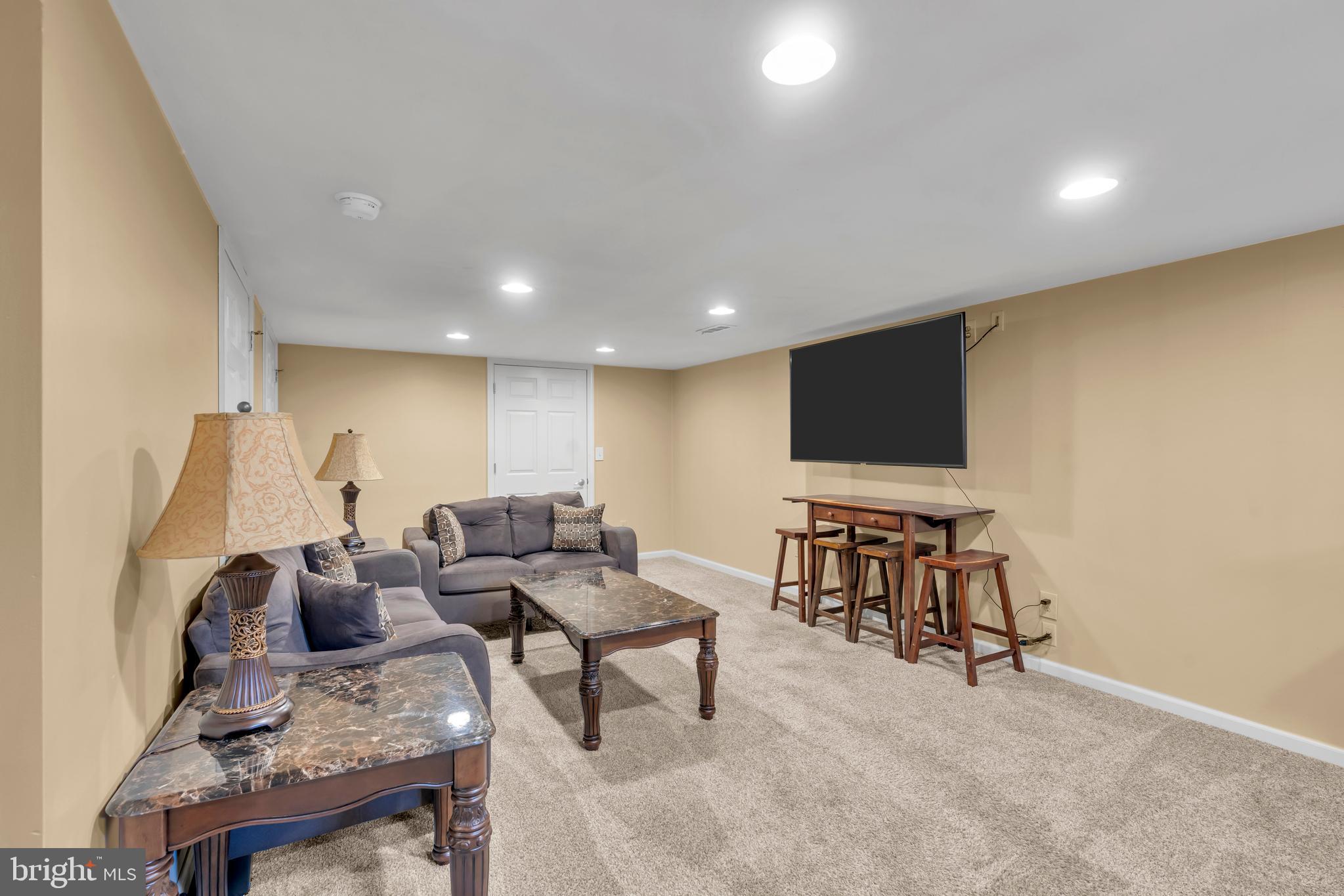 516 River Drive Riverside, NJ 08075 - Photo 31 of 82 a living room with furniture and a flat screen tv