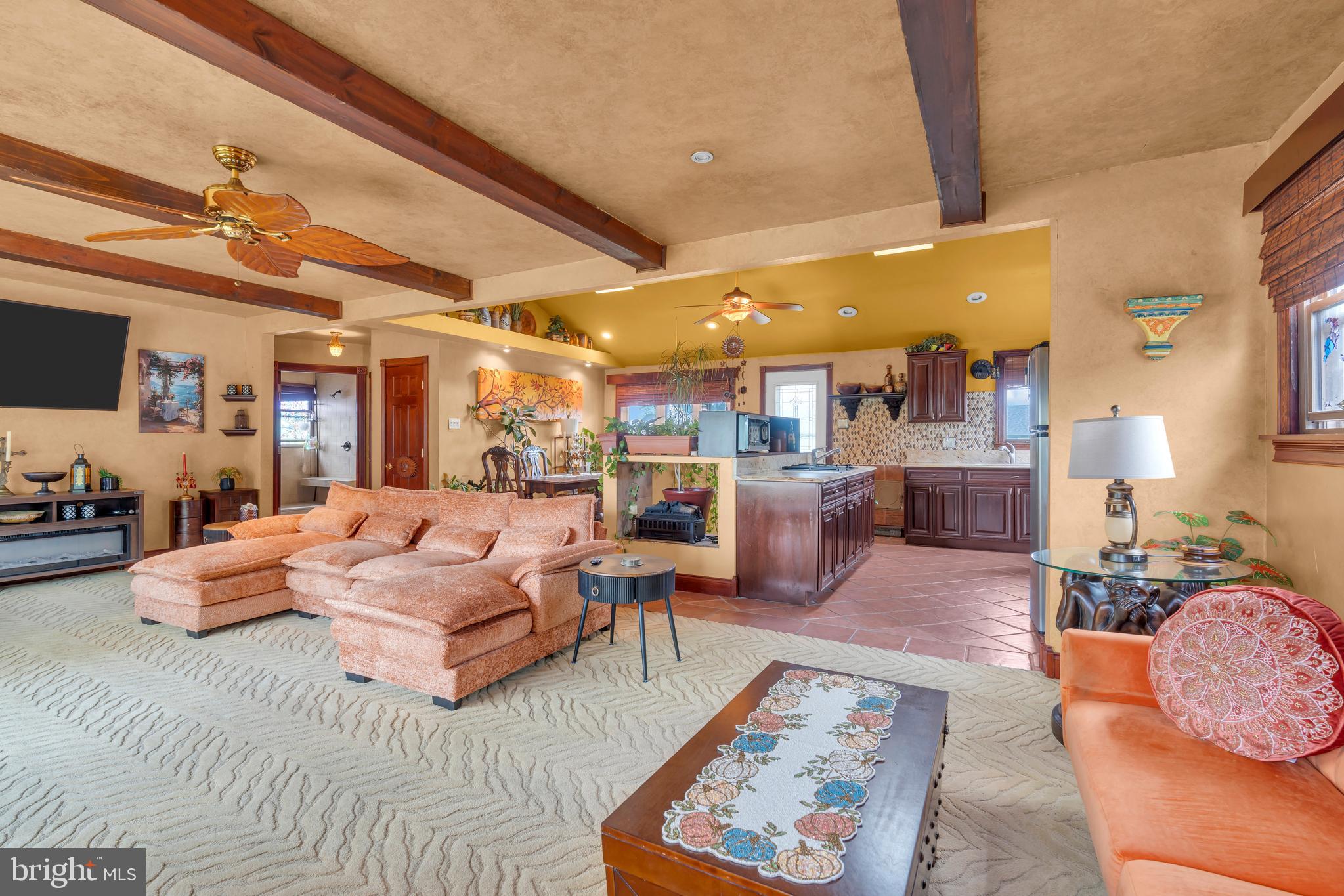 516 River Drive Riverside, NJ 08075 - Photo 48 of 82 a living room with furniture kitchen view and a table
