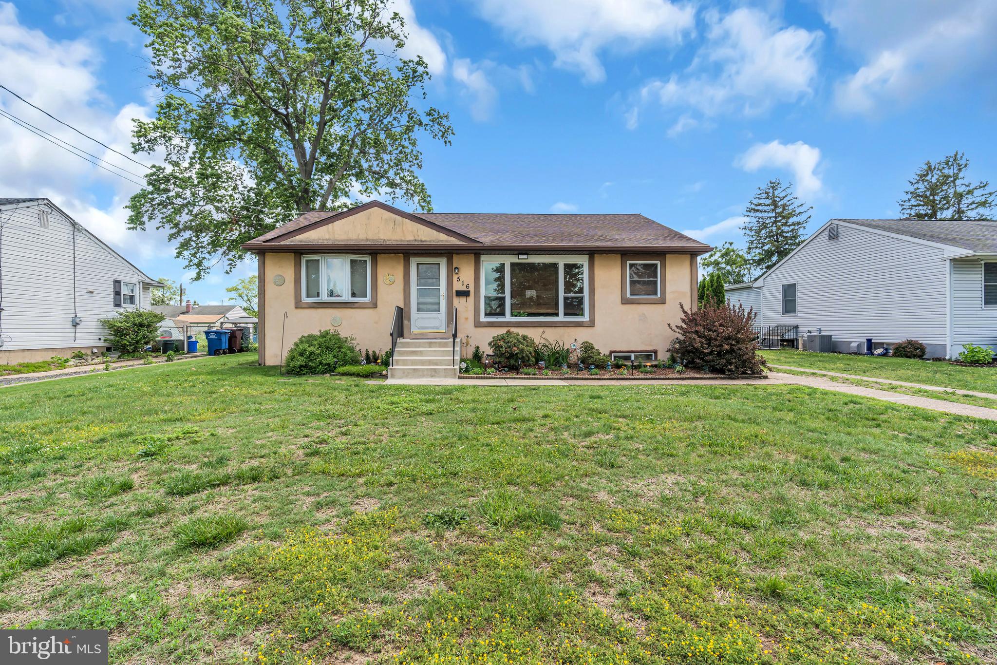 516 River Drive Riverside, NJ 08075 - Photo 69 of 82 a front view of a house with garden