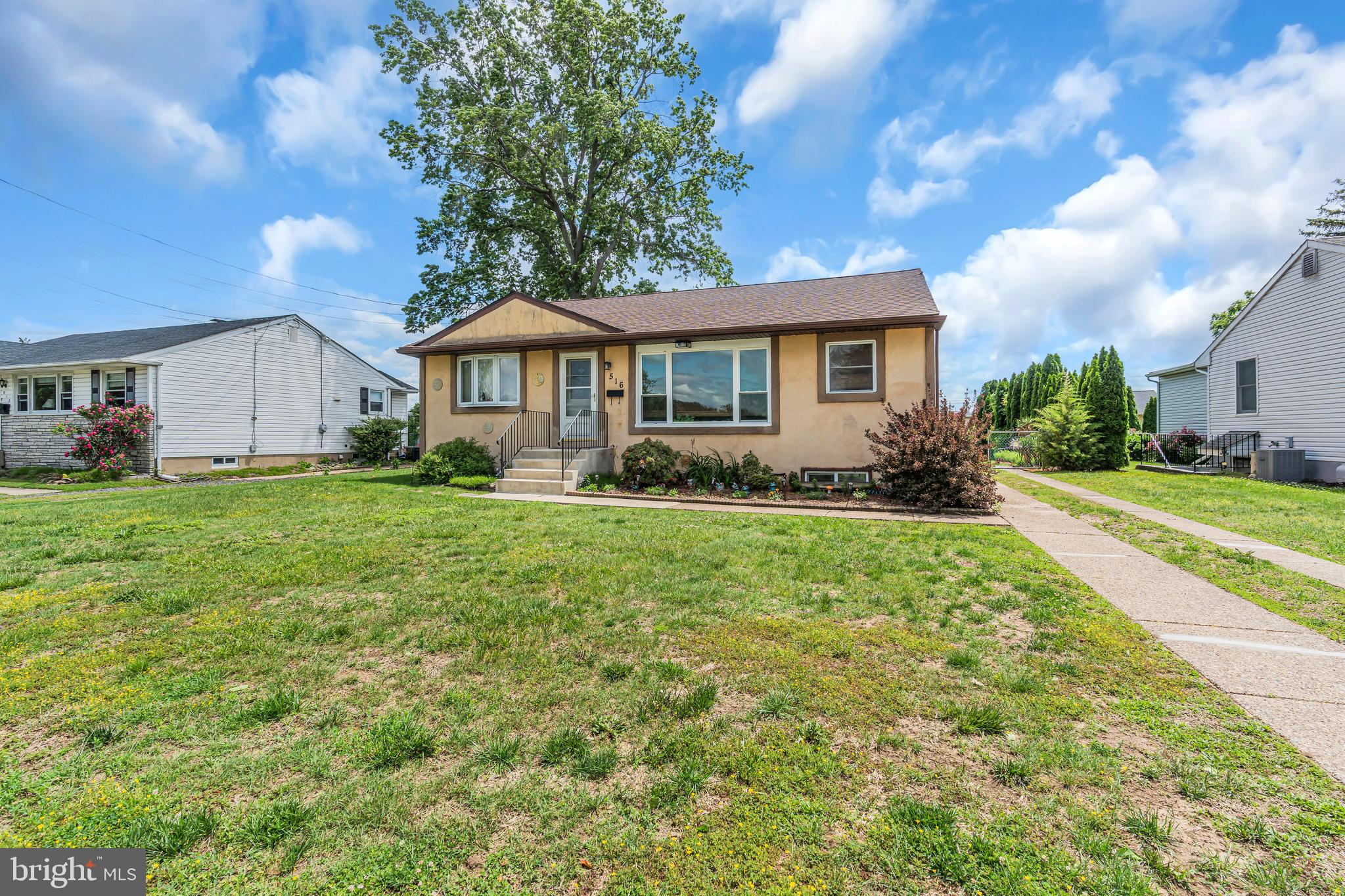 516 River Drive Riverside, NJ 08075 - Photo 70 of 82 a front view of a house with garden
