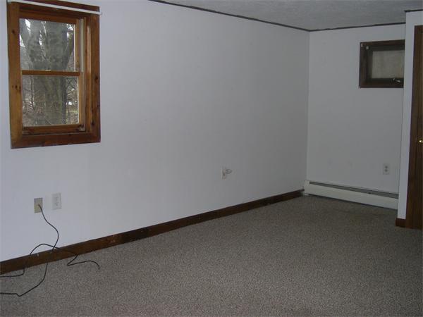 43 Park Road Charlton, MA 01507 - Photo 21 of 26 a view of a small space with wooden floor and a window