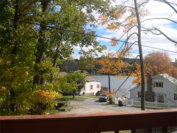 43 Park Road Charlton, MA 01507 - Photo 6 of 26 a view of a house with a tree in the background