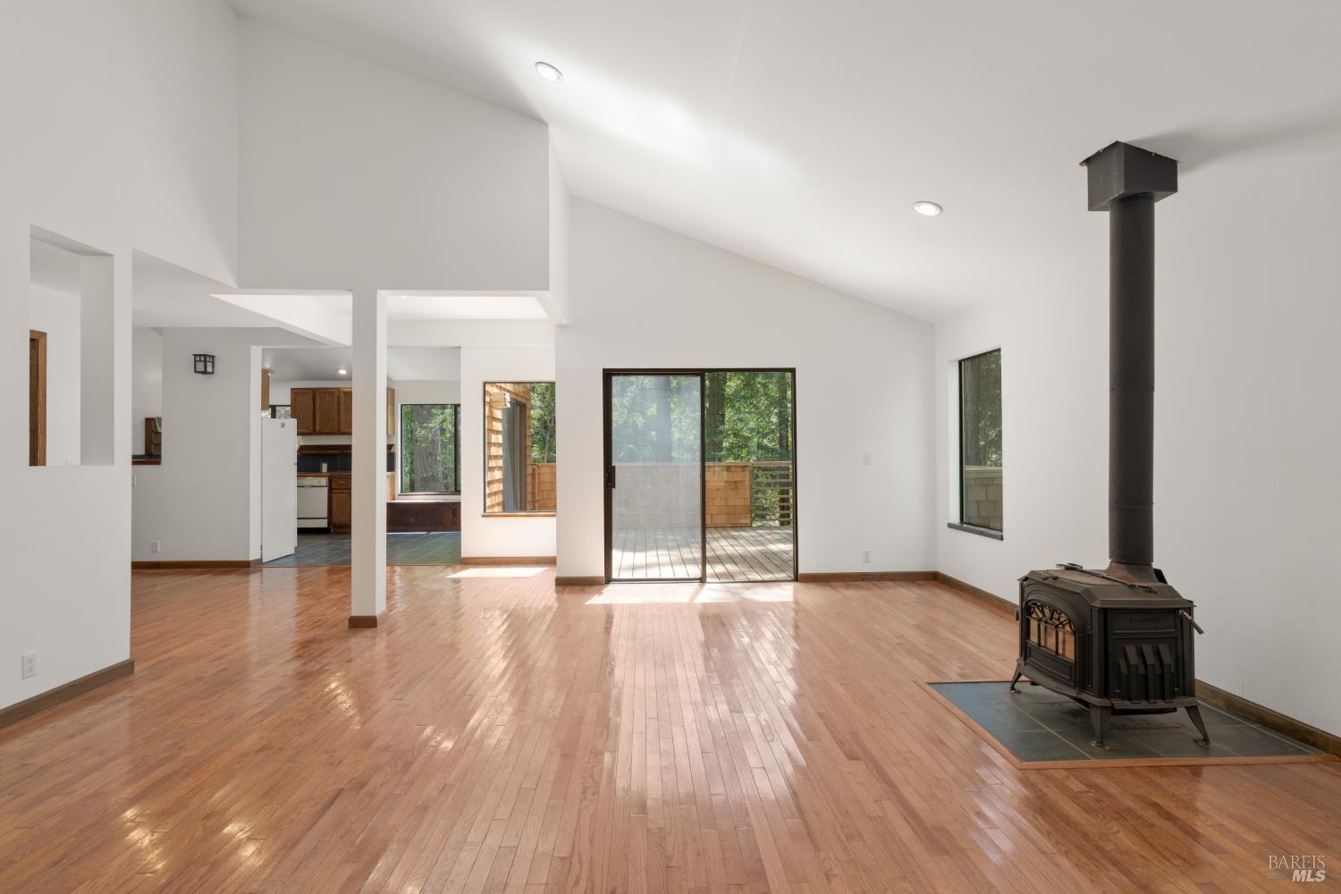 355 Chinquapin Lane The Sea Ranch, CA 95497 - Photo 5 of 31 a view of an empty room with wooden floor and a window