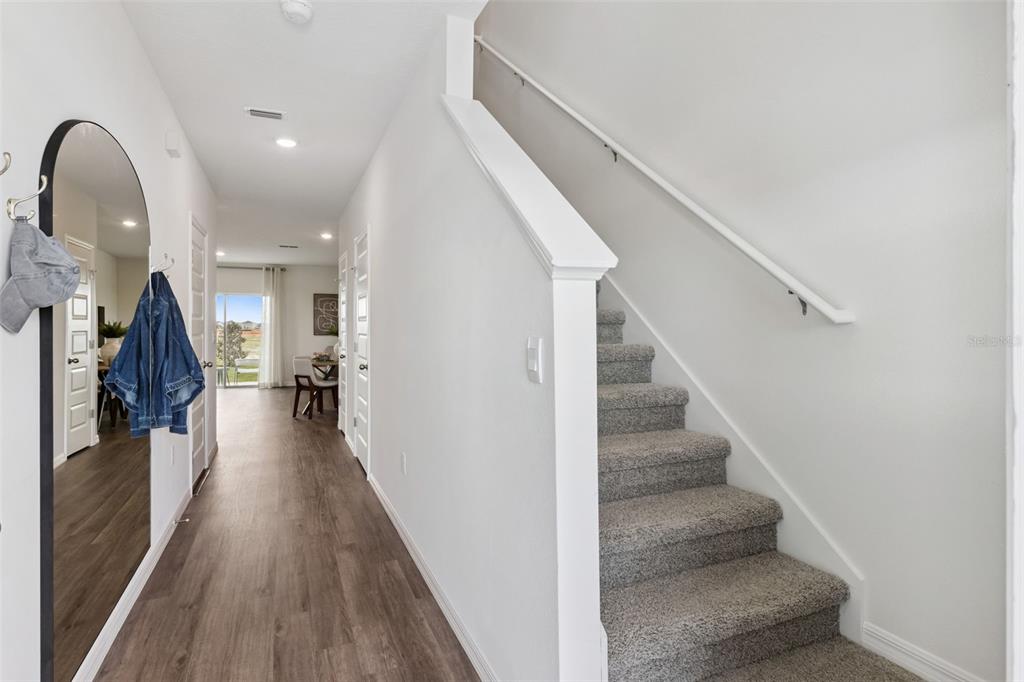 4356 Butterscotch Circle Lakeland, FL 33811 - Photo 4 of 30 a view of entryway and hall with wooden floor