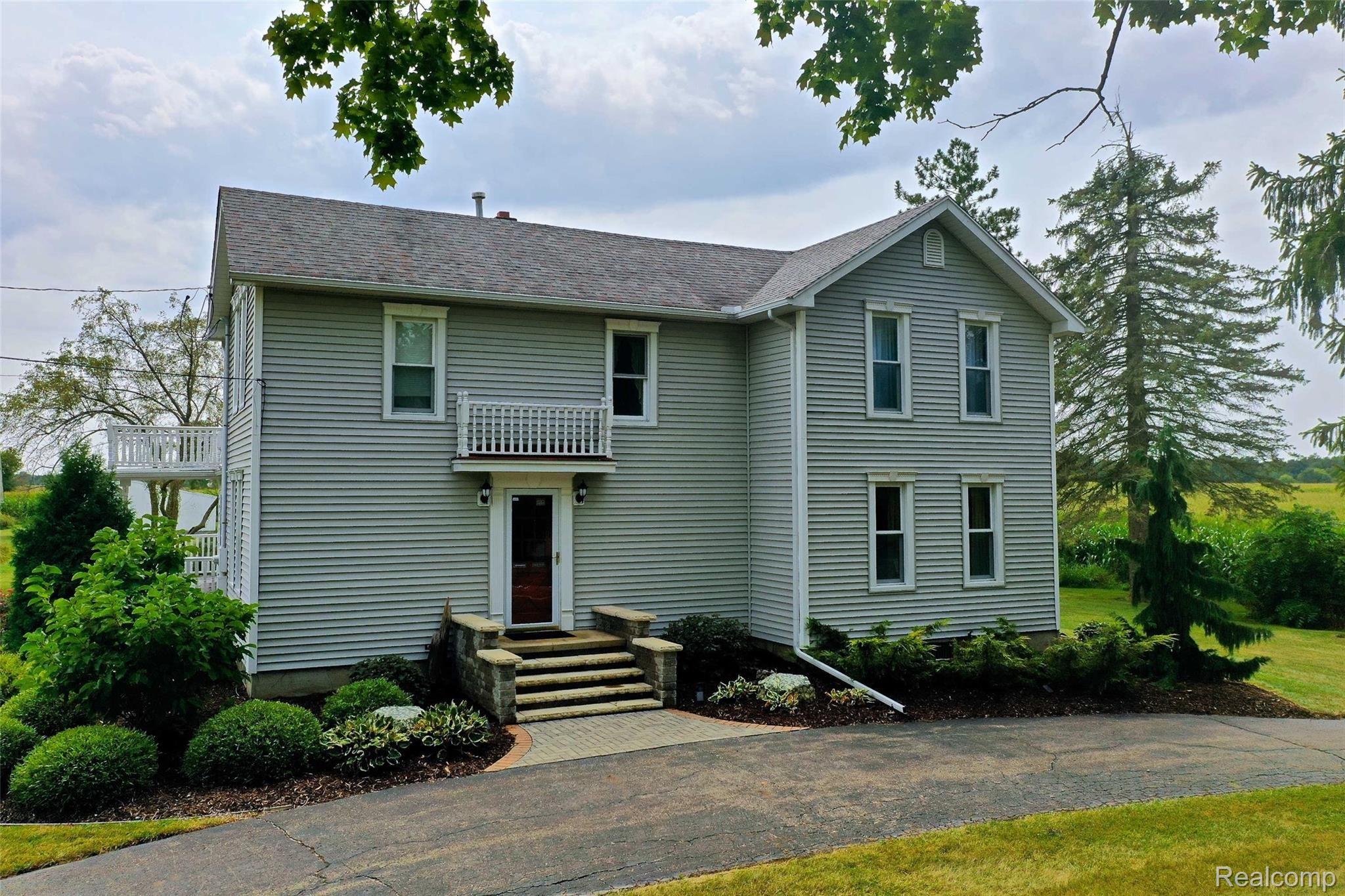 5173 Reid Road Swartz Creek, MI 48473 - Photo 9 of 88 5173-Reid-Rd-62 Outside.jpg