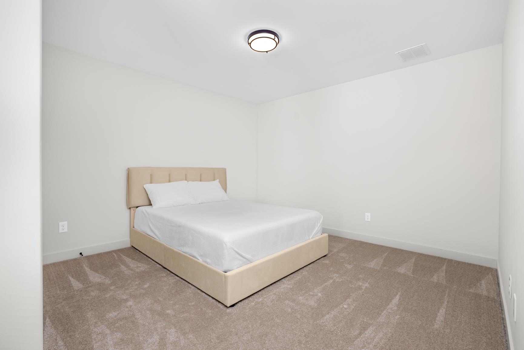 5628 Gerber Road Arlington, TN 38002 - Photo 34 of 40 Carpeted bedroom featuring baseboards