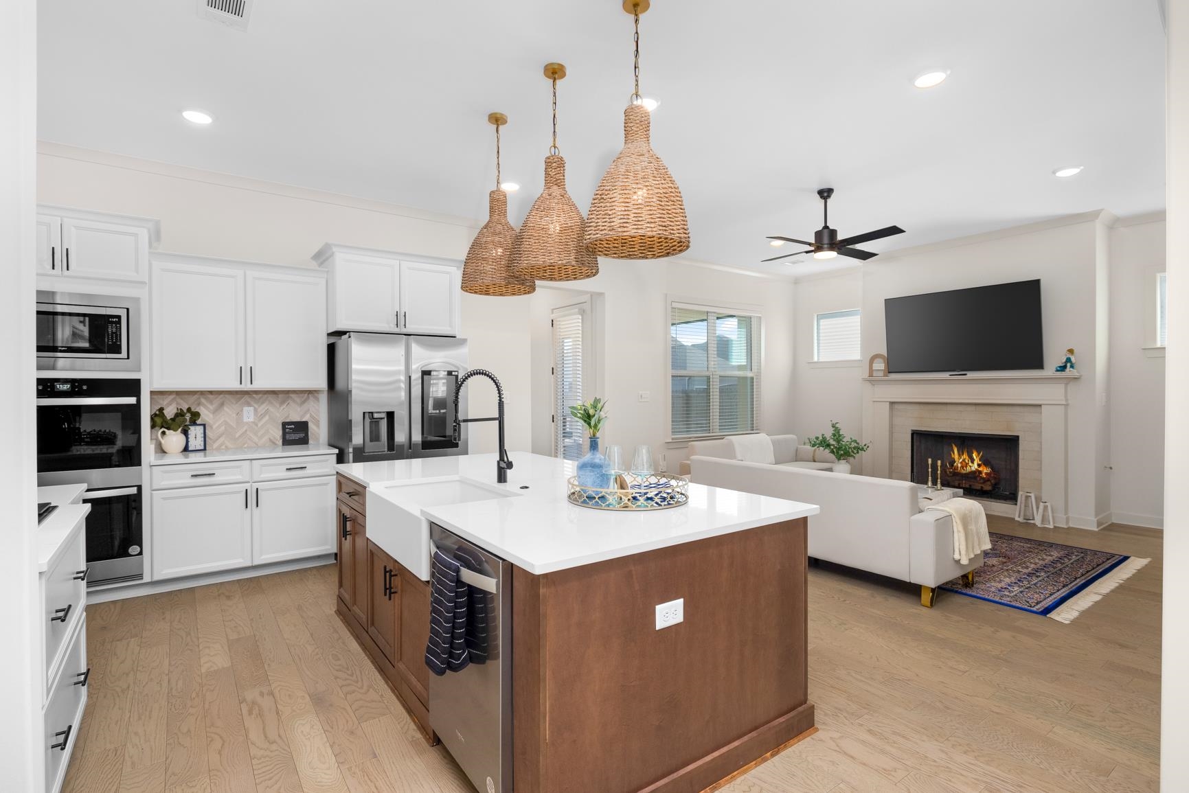 5628 Gerber Road Arlington, TN 38002 - Photo 6 of 40 Kitchen featuring white cabinetry, decorative light fixtures, recessed lighting, tasteful backsplash, and light wood-style flooring