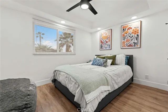 a bedroom with a bed and furniture