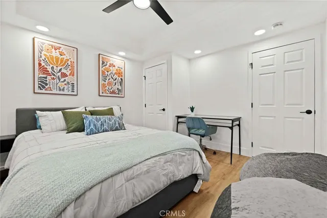a bathroom with a sink a toilet and shower curtain