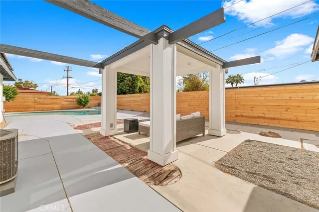 a view of a house with basketball court