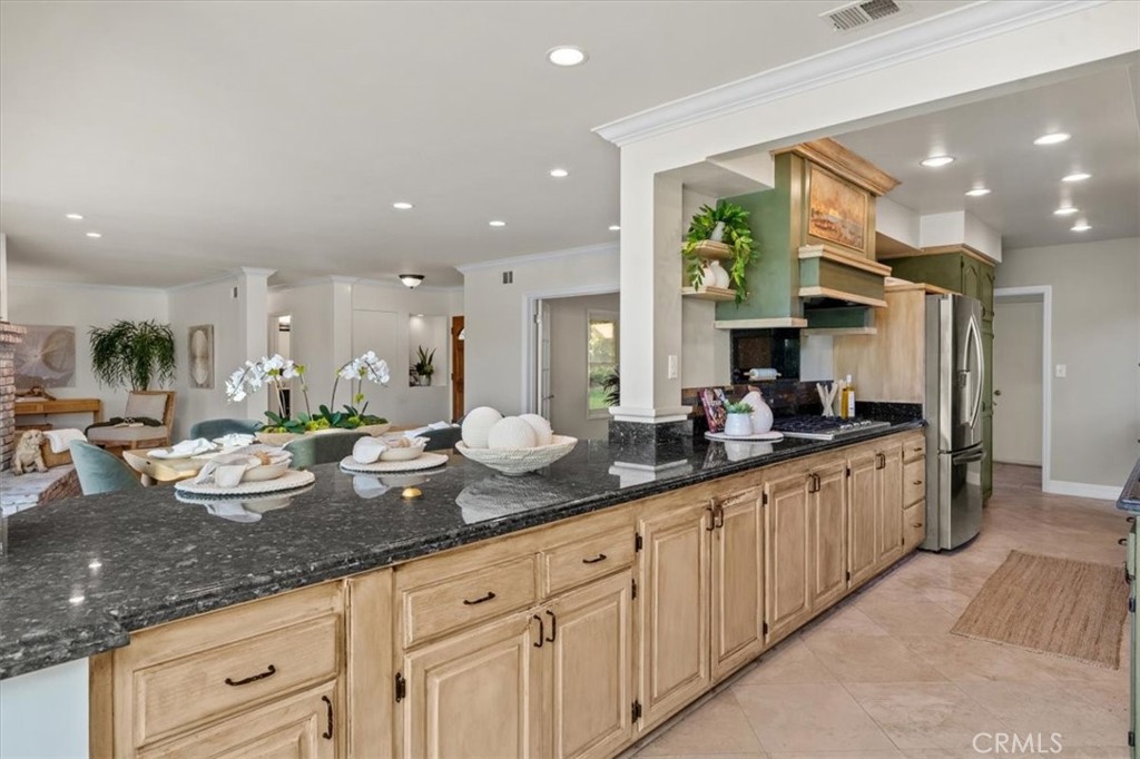 54 Ranchview Road Rolling Hills Estates, CA 90274 - Photo 11 of 60 a large kitchen with granite countertop lots of counter space and view of living room