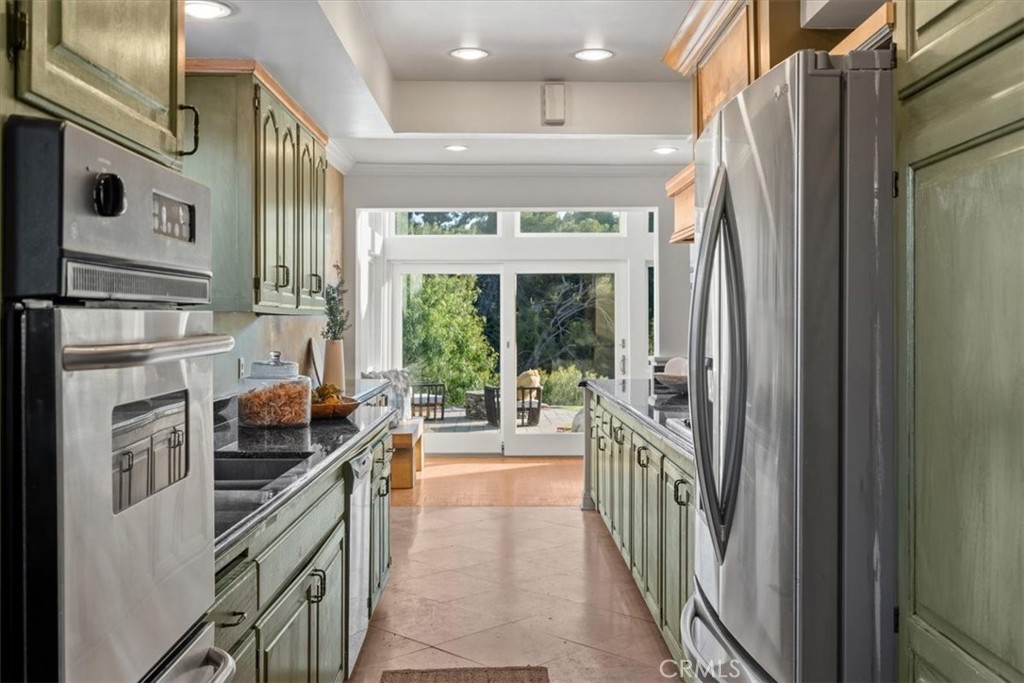 54 Ranchview Road Rolling Hills Estates, CA 90274 - Photo 12 of 60 a kitchen with stainless steel appliances a refrigerator and a stove
