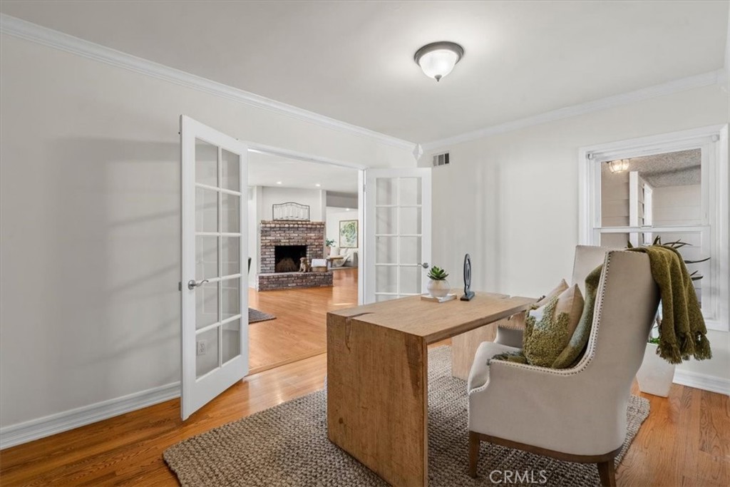 54 Ranchview Road Rolling Hills Estates, CA 90274 - Photo 15 of 60 a dining room with furniture and wooden floor