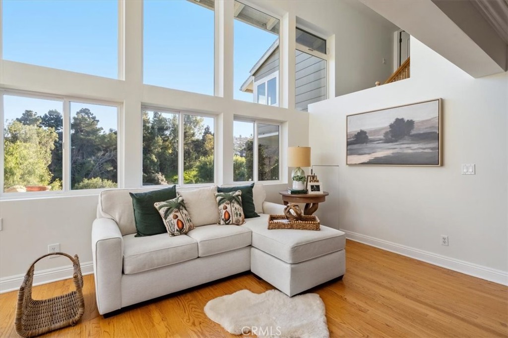54 Ranchview Road Rolling Hills Estates, CA 90274 - Photo 2 of 60 a living room with furniture and a large window