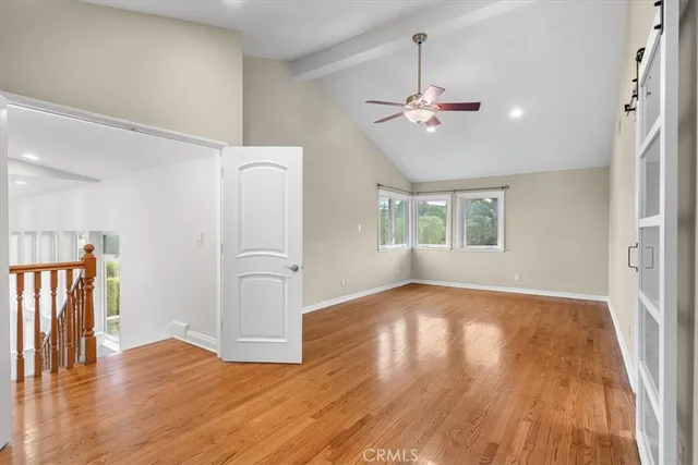 a bathroom with a shower and a toilet