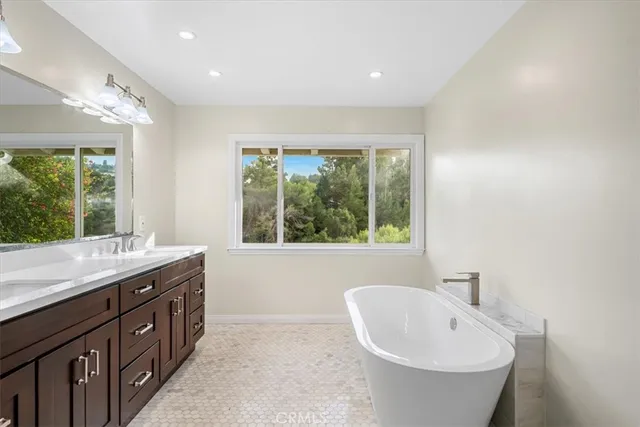 a view of a house with backyard porch and garden