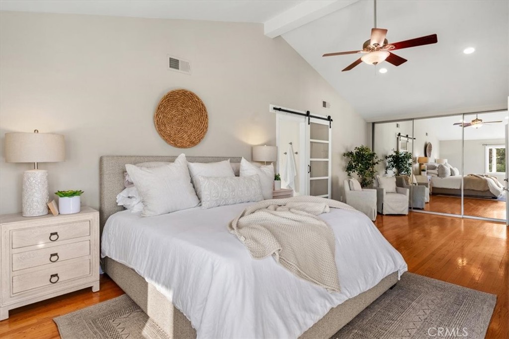 54 Ranchview Road Rolling Hills Estates, CA 90274 - Photo 39 of 60 a bedroom with bed and a chandelier